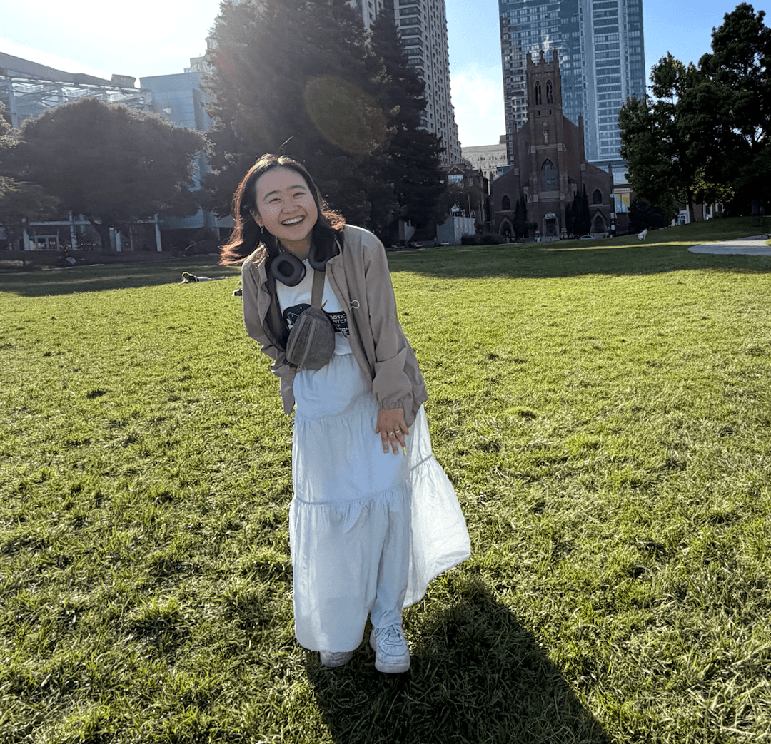 Jia Chen wearing a white skirt at Yerba Buena Gardens in San Francisco